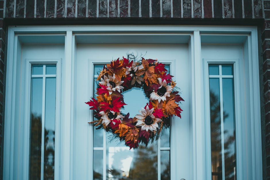 Various fall wreath designs displayed together, showcasing different colors and decorations.